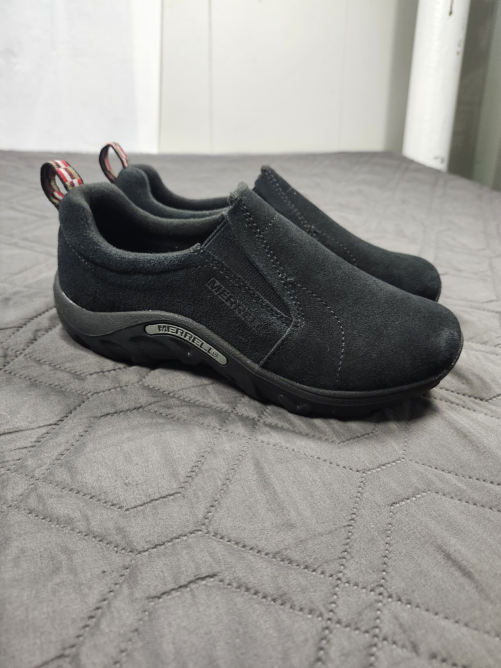 Merrell Jungle Moc slip-on shoes black suede upper, textured rubber sole